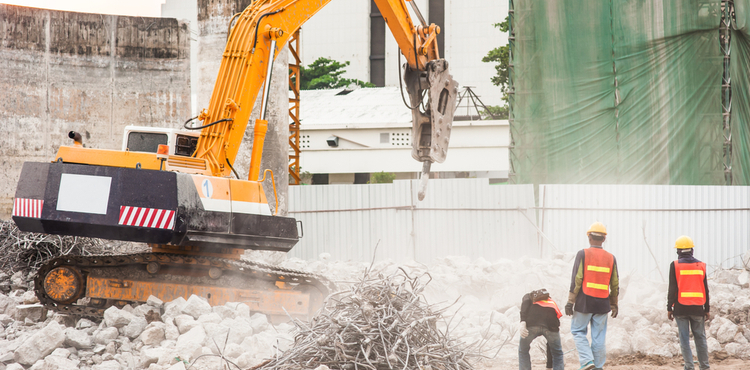 Bulldozer with construction workers. Bulldozer with construction workers.