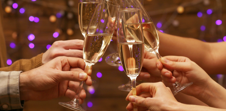 People celebrating with champagne. People celebrating with champagne.