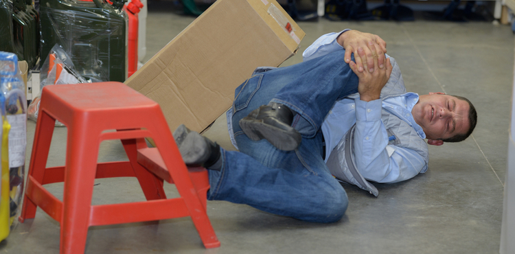 Injured man on floor. Injured man on floor.