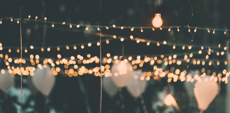 Festive lights and white balloons. Festive lights and white balloons.