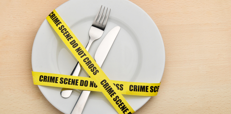 Dinner plate with crime scene tape.
