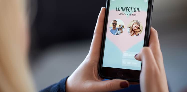 Woman connects on phone dating app. Woman connects on phone dating app.