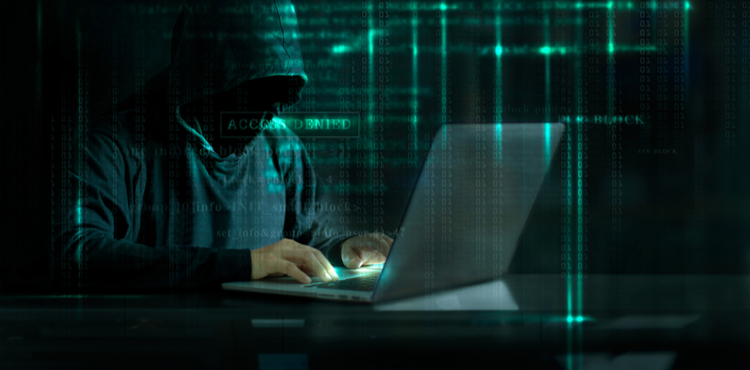 Hacker working on computer. Hacker working on computer.