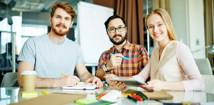 Team of three in a meeting. Team of three in a meeting.