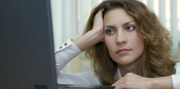 Woman looking at laptop. Woman looking at laptop.