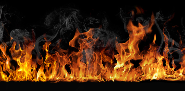 Fire across a black background. Fire across a black background.