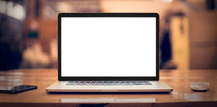 An open laptop with a bright screen. An open laptop with a bright screen.