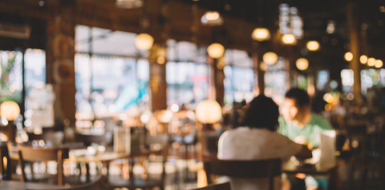 The blurry interior of a restaurant. The blurry interior of a restaurant.