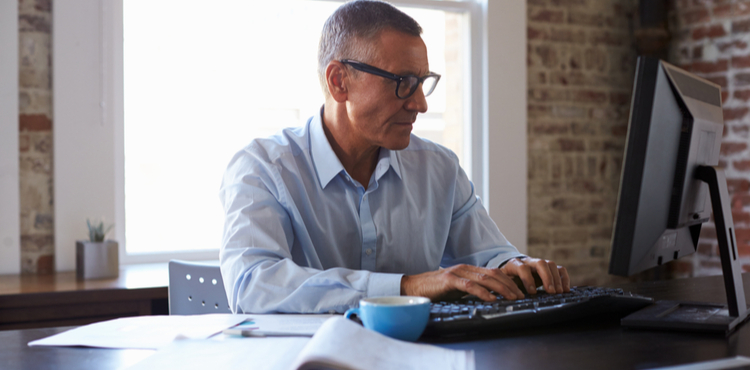 Man using computer. Man using computer.