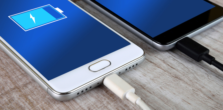 Smartphones charging. Smartphones charging.