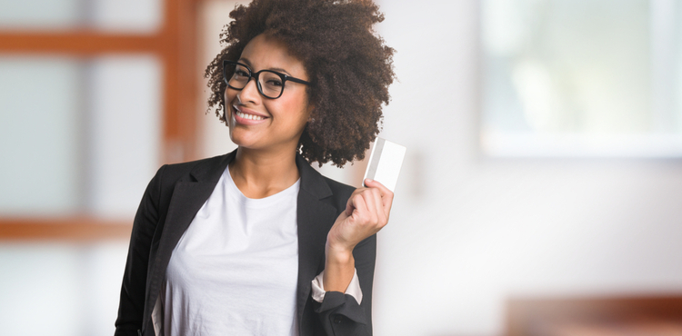 Woman holding credit card. Woman holding credit card.