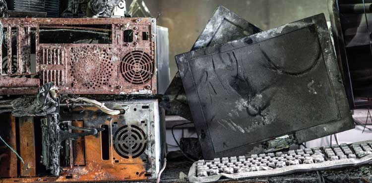 A pile of burnt computers.