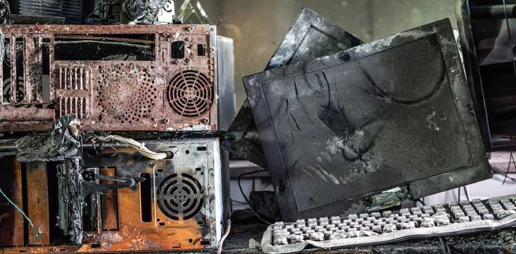 A pile of burnt computers. A pile of burnt computers.
