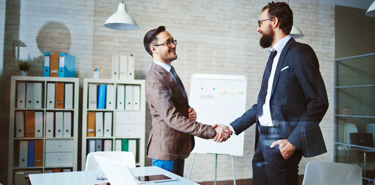 Two businessmen shaking hands Two businessmen shaking hands