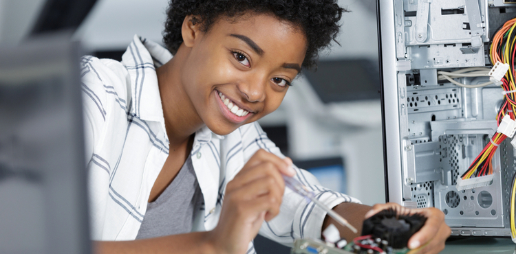 Computer technician working on hardware. Computer technician working on hardware.