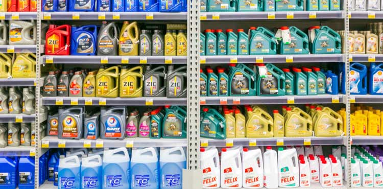 Detergent lined up on store shelves for sale. Detergent lined up on store shelves for sale.