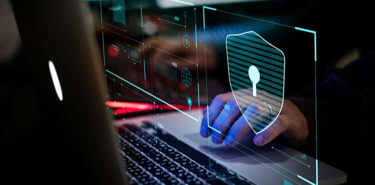 A laptop and a lock symbol. A laptop and a lock symbol.