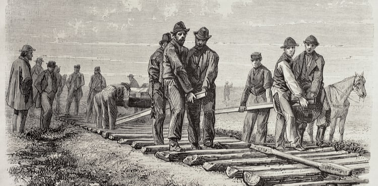 A lithograph of railroad workers. A lithograph of railroad workers.
