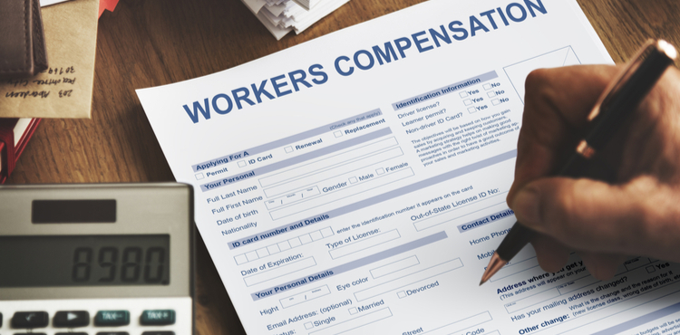 A workers' compensation form being filled out. A workers' compensation form being filled out.