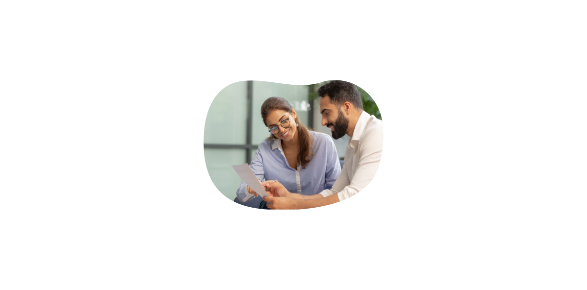 Two people comparing insurance quotes Two people comparing insurance quotes