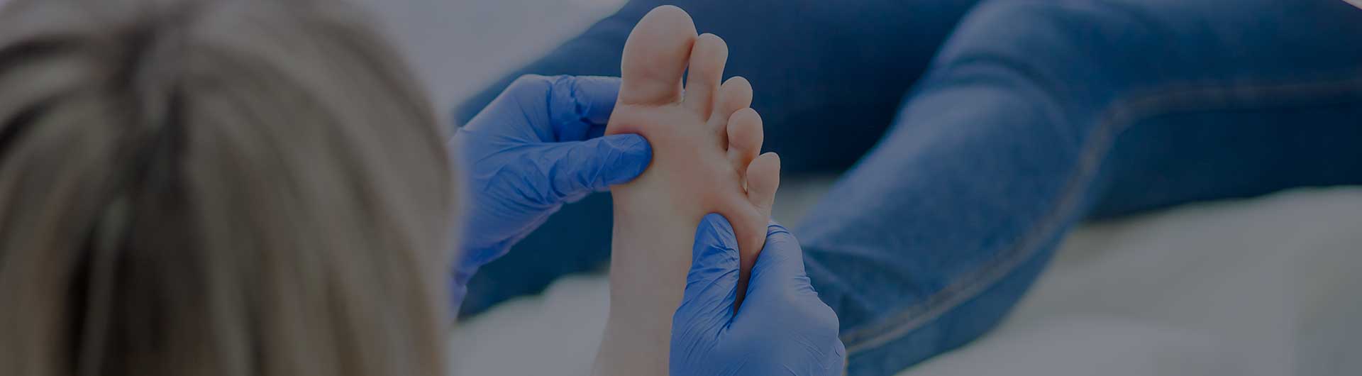 Podiatrist treats foot.