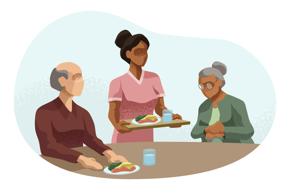 Woman serving a meal to an elderly man and woman.