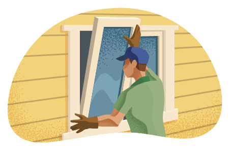 Person in gloves and hat installing a window on a home.