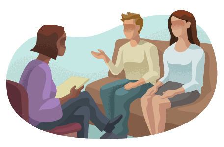 Female marriage therapist speaking with a couple.