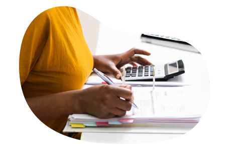 A small business owner calculating their business interruption costs