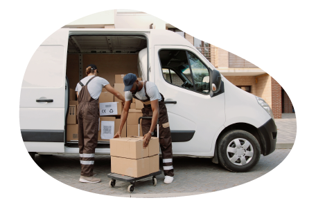 A small business owner and their employee loading the company van with deliveries