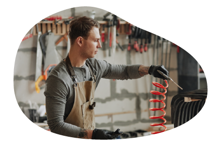 A contractor using their tools to complete a client project A contractor using their tools to complete a client project