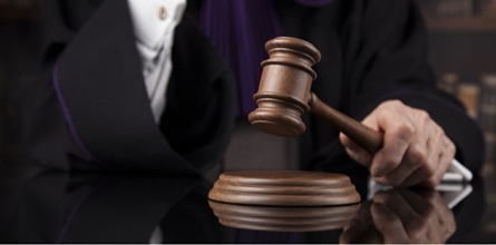 Picture of judge with gavel.