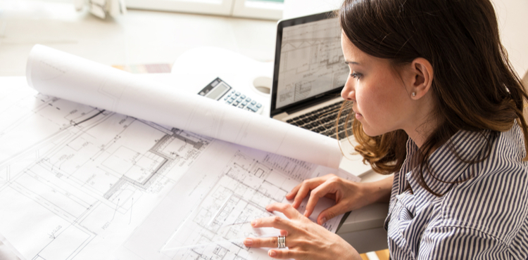 Architect with blueprints.