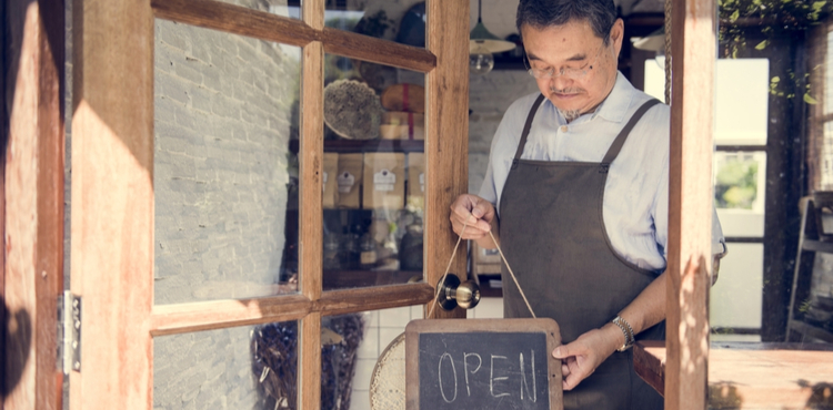 Man opening shop.