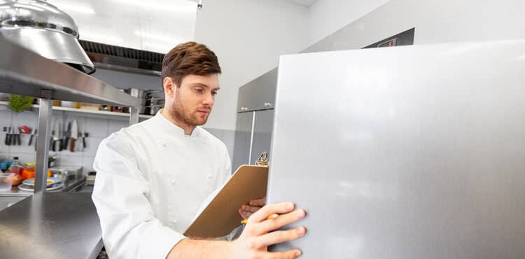 Chef in a restaurant kitchen Chef in a restaurant kitchen