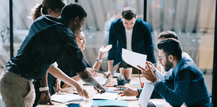 Group of employees collaborating on a project.