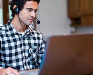 Remote employee on video conference call.