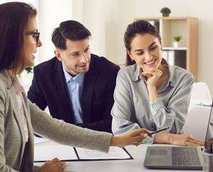 Insurance agent talking with potential clients