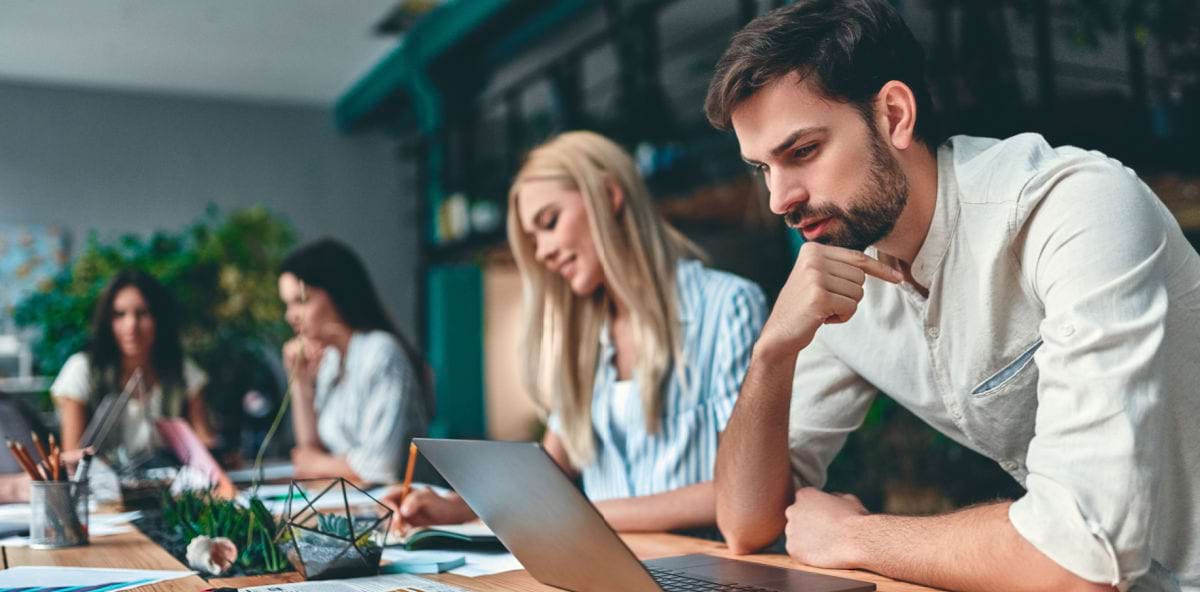 IT freelancers connecting and networking in a co-work space IT freelancers connecting and networking in a co-work space