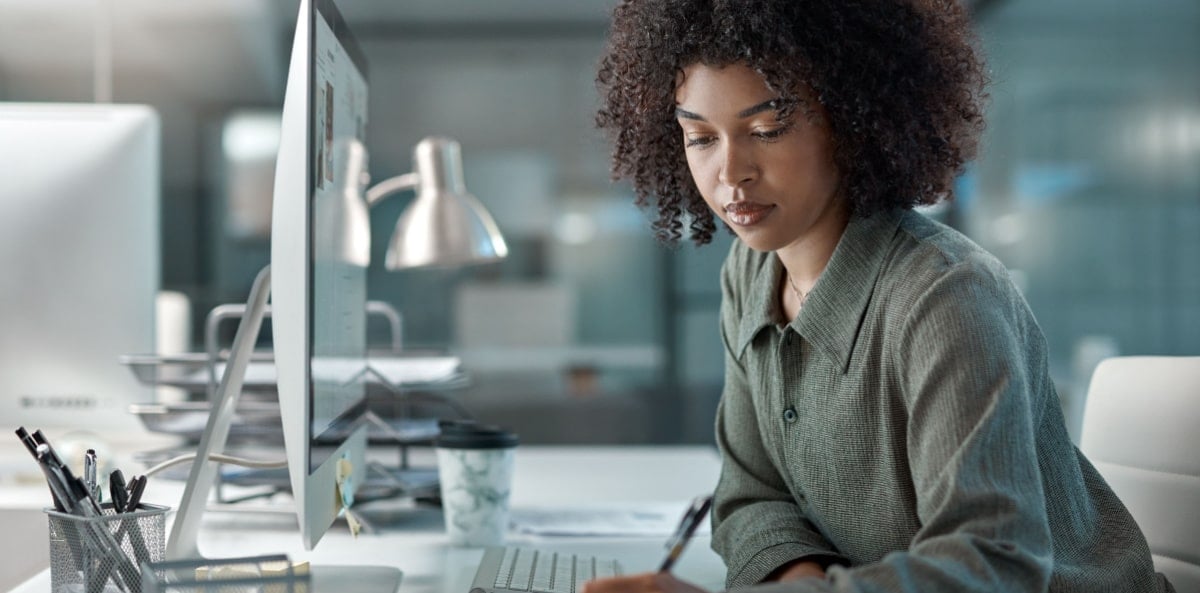 Sole proprietor working in their home office. Sole proprietor working in their home office.