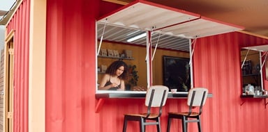 Small business owner with a pop-up restaurant waiting for customers.