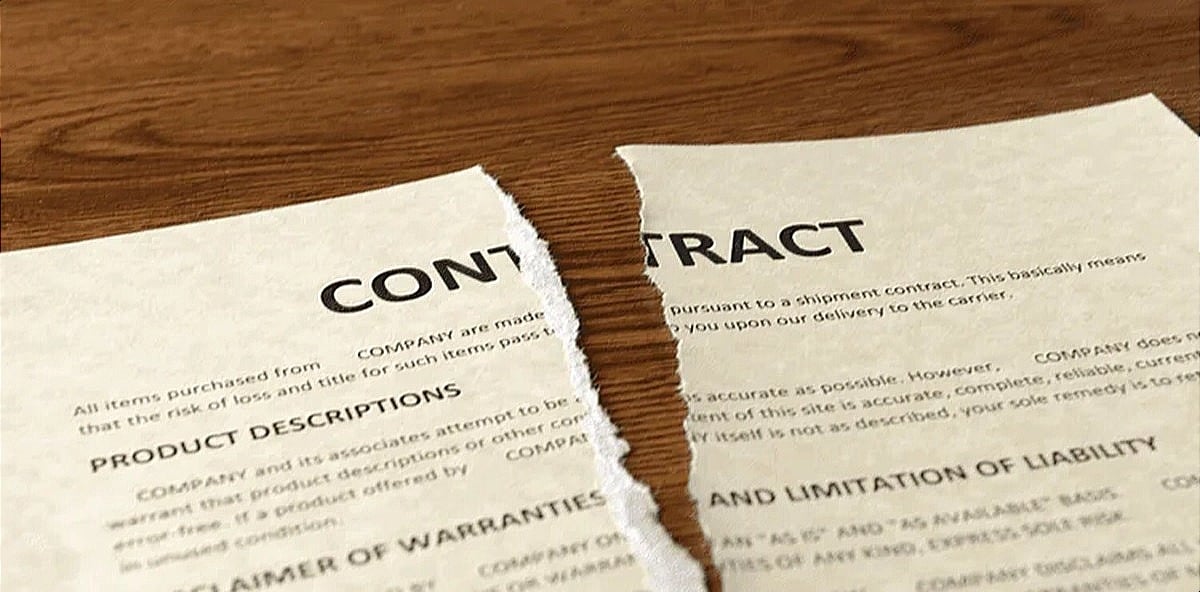 Client contract torn in half. Client contract torn in half.