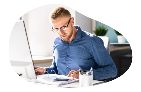 Bookkeeper reviewing business finances. Bookkeeper reviewing business finances.