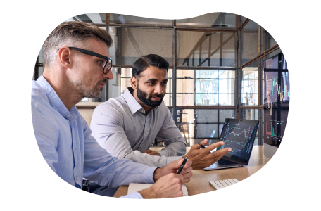 Stock brokers reviewing latest market trends.