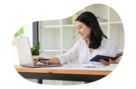 Tax preparer looking over a client's finances. Tax preparer looking over a client's finances.