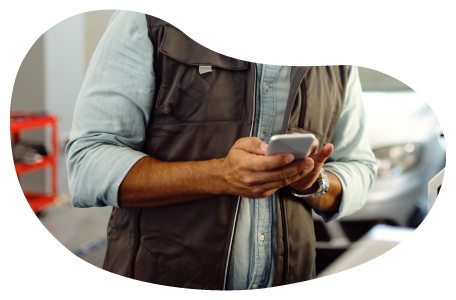 Auto services employee calculating insurance costs.