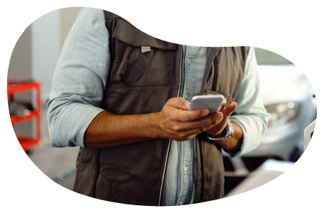 Auto services employee calculating insurance costs. Auto services employee calculating insurance costs.