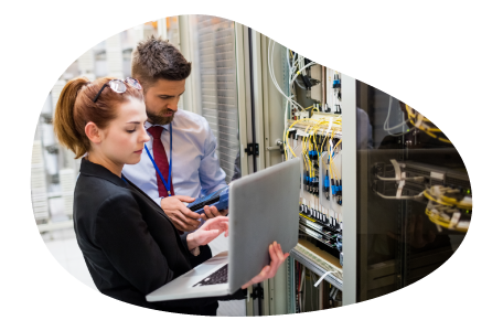 Control system integrators inspecting system wiring.