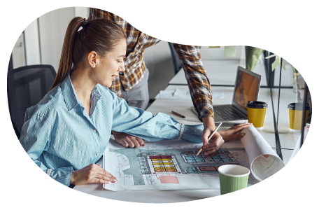 Draftsman working on a schematic. Draftsman working on a schematic.