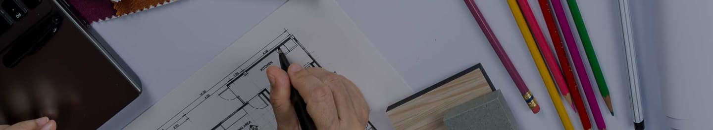 An interior designer sketching.